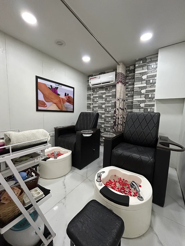 Private pedicure room with comfortable chairs