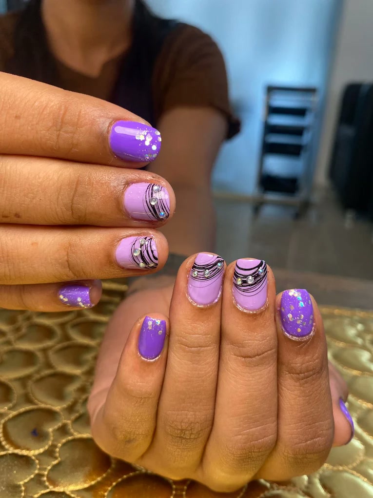 Purple gel nail art